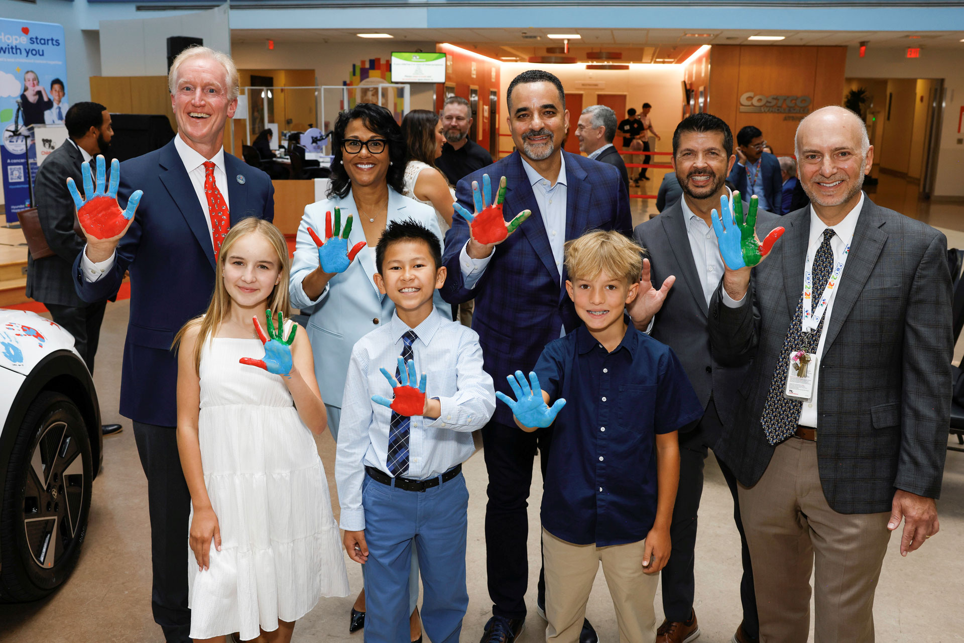 (left to right) Kevin Reilly, vice chair, Hyundai Hope on Wheels, Emmy Cole, national youth ambassador, Hyundai Hope on Wheels, Michelle Riley-Brown, MHA, FACHE, president and CEO, Children's National Hospital, Jackson Trinh, national youth ambassador, Hyundai Hope on Wheels, Randy Parker, president and CEO, Hyundai Motor North America, John Guastaferro, executive director, Hyundai Hope on Wheels, Jeffrey Dome, MD, senior vice president, Center for Cancer and Blood Disorders, Children's National Hospital at Children’s National Hospital in Washington, D.C., on Sept. 2, 2025 (Photo/Hyundai)